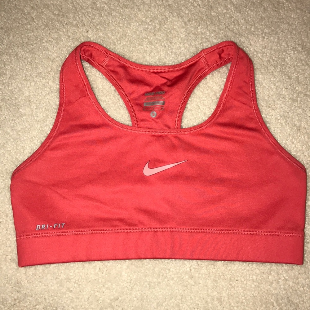 Coral orange Nike sports bra